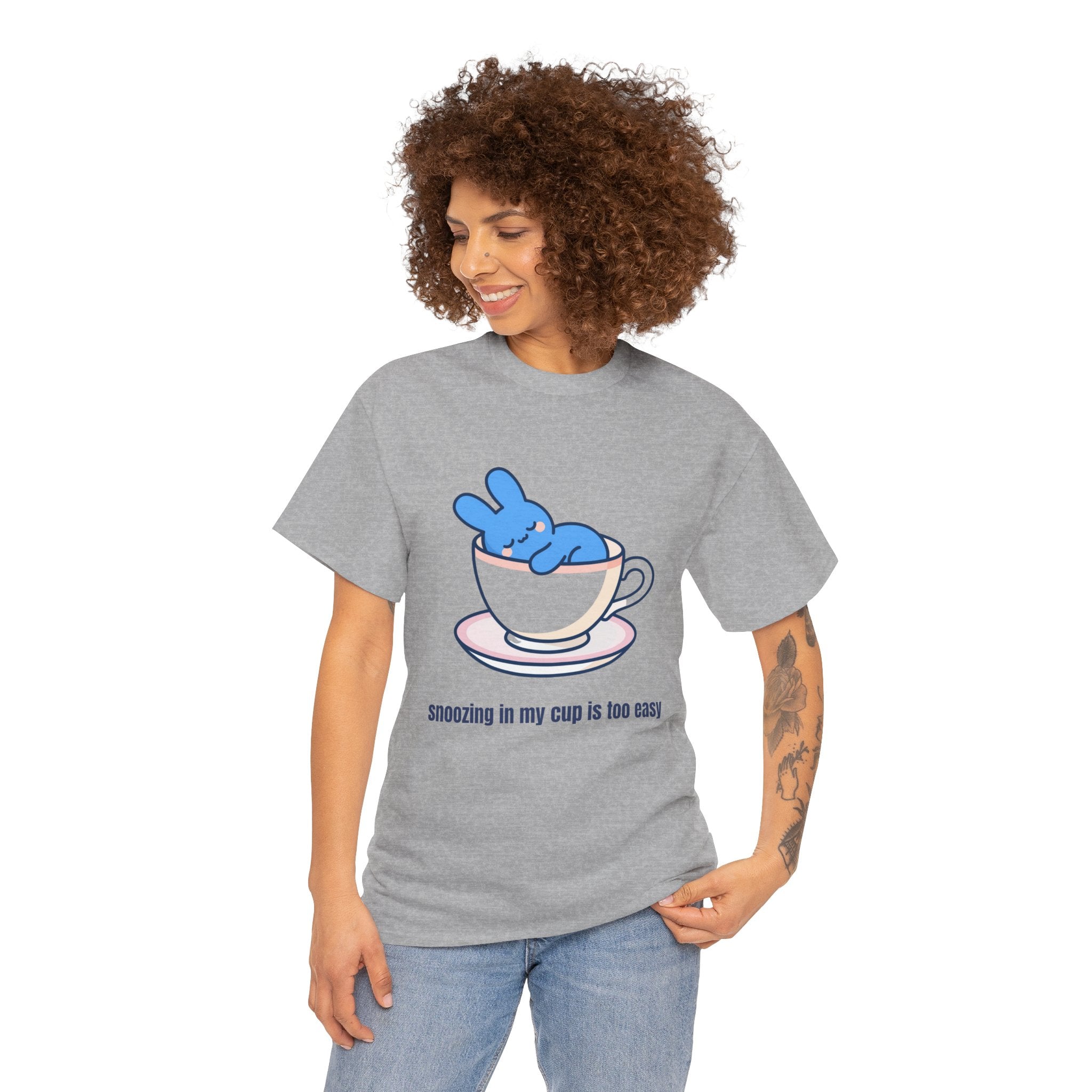 Cute Bunny Tea Tee — "Snoozing in My Cup is Too Easy" Graphic T-Shirt - Steep Dreams – Why sit beside a cup when you can sleep IN one? 😴☕ Our little blue bunny has found the cosiest nap spot imaginable — and honestly, we're jealous. S